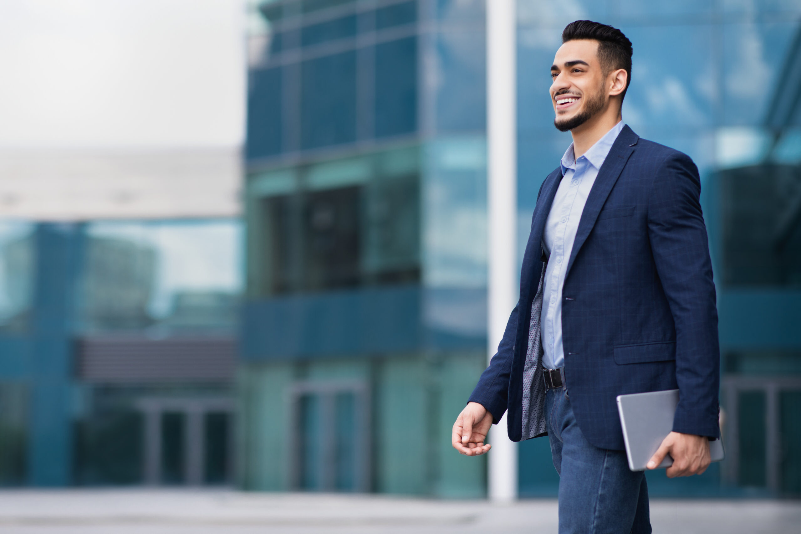 young-businessman-walking-from-office